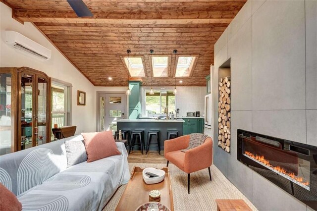 361 Rising Star Rd, Ellijay, GA 30536 - living area featuring wood ceiling, a wall mounted air conditioner, vaulted ceiling, a fireplace, and a skylight