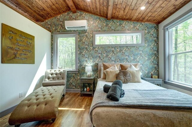 361 Rising Star Rd, Ellijay, GA 30536 - bedroom with a wall mounted air conditioner, wooden ceiling, wood finished floors, lofted ceiling, and wallpapered walls
