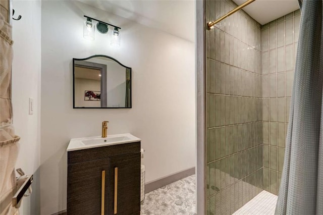 361 Rising Star Rd, Ellijay, GA 30536 - bathroom featuring a tile shower, vanity, and toilet