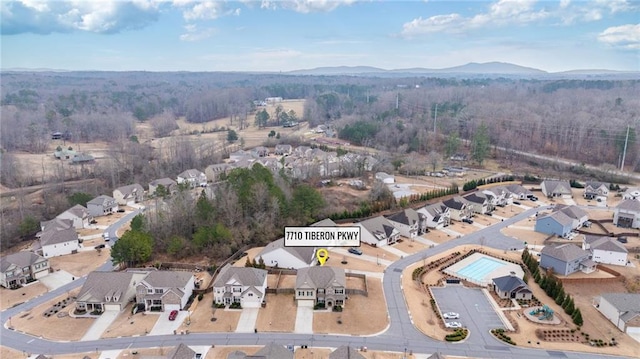 drone / aerial view featuring a mountain view