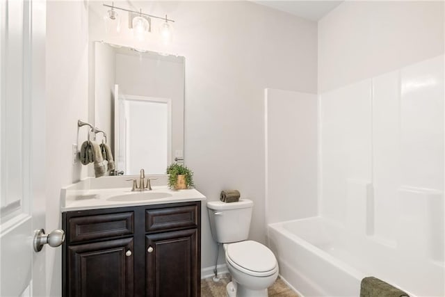 full bathroom featuring vanity, toilet, and washtub / shower combination