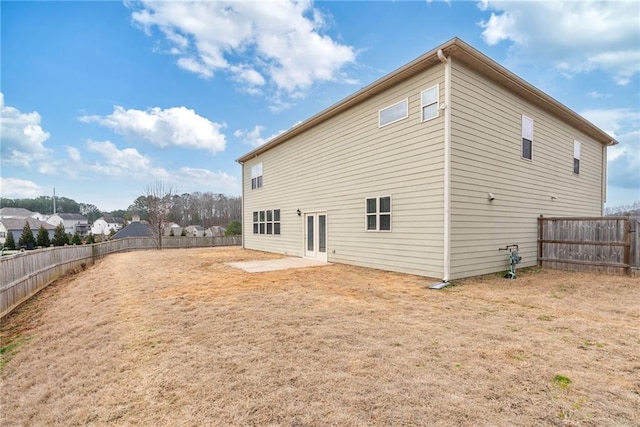 rear view of property with a patio area