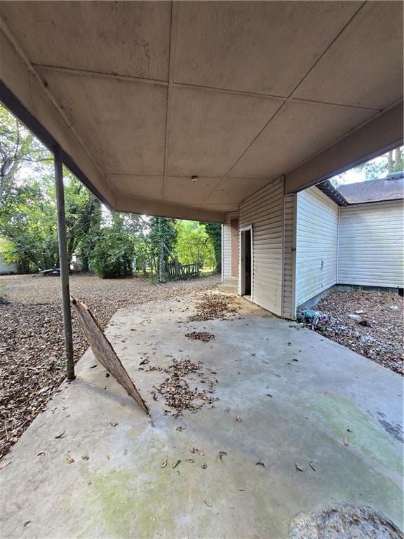 view of patio with a carport