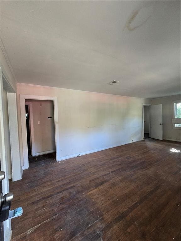spare room with hardwood / wood-style floors