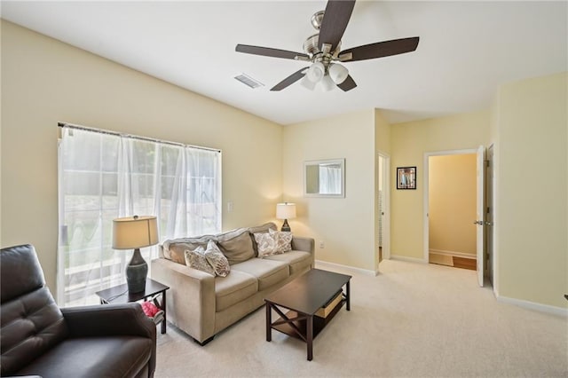 3705 Tate Pl, Austell, GA 30106 - living area featuring a ceiling fan, baseboards, and light colored carpet