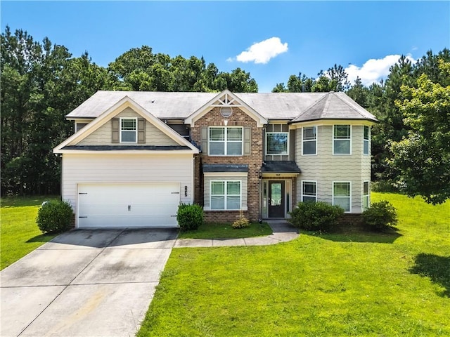 1492 Station Ridge Ct, Lawrenceville, GA 30045 - view of front of home with driveway, brick siding, a front lawn, and a garage