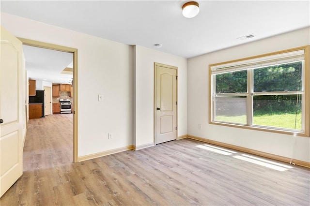 1492 Station Ridge Ct, Lawrenceville, GA 30045 - unfurnished room featuring light wood-style flooring and baseboards