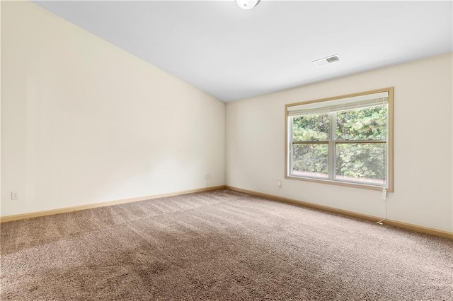 1492 Station Ridge Ct, Lawrenceville, GA 30045 - carpeted spare room with baseboards and lofted ceiling