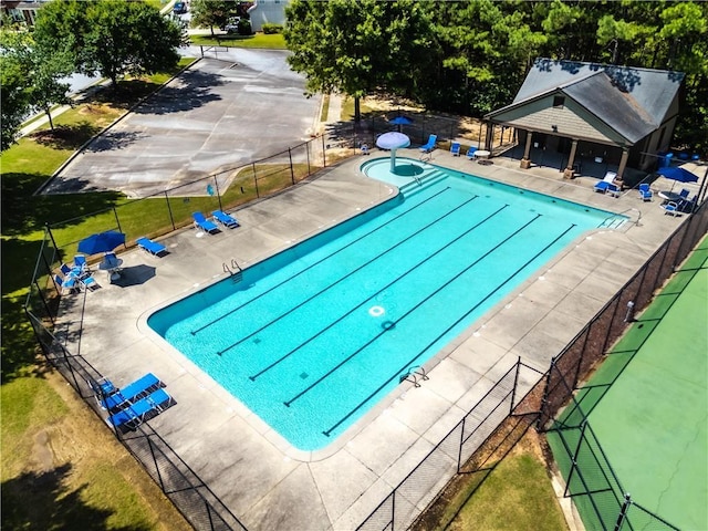 1492 Station Ridge Ct, Lawrenceville, GA 30045 - community pool featuring a patio area
