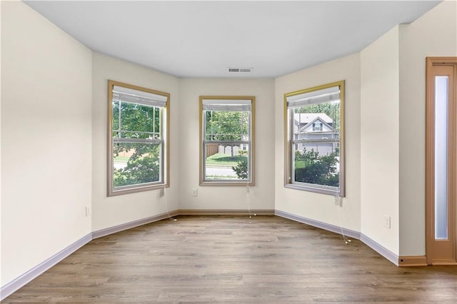 1492 Station Ridge Ct, Lawrenceville, GA 30045 - empty room with wood finished floors and baseboards