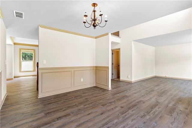 1492 Station Ridge Ct, Lawrenceville, GA 30045 - empty room with a chandelier and dark wood finished floors