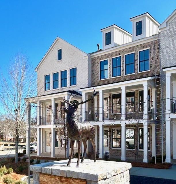 view of front of home with brick siding