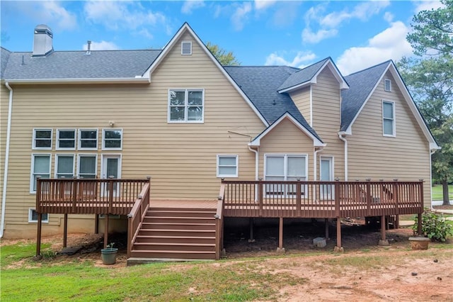 back of property featuring a deck