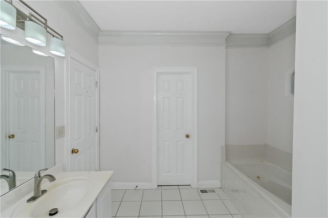 bathroom with vanity, a bath, tile patterned floors, and ornamental molding