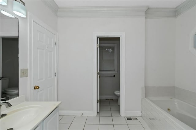 bathroom with toilet, crown molding, vanity, tiled bath, and tile patterned flooring