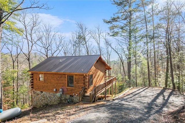 view of home's exterior with a deck