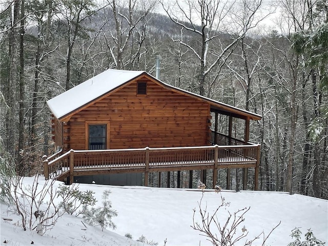 view of snow covered property