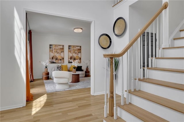 stairway featuring hardwood / wood-style floors