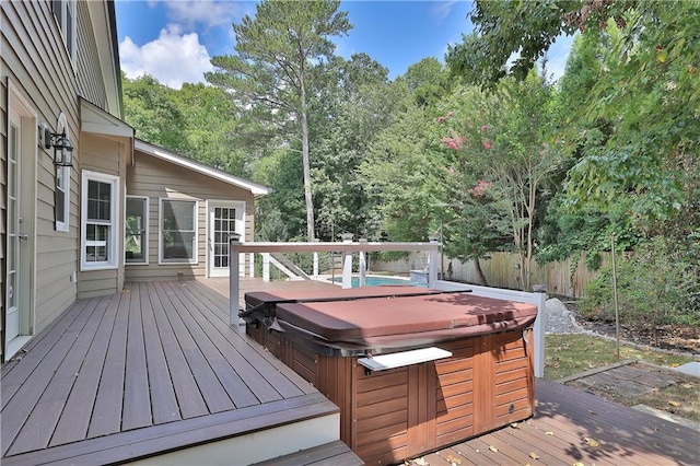 deck with a hot tub