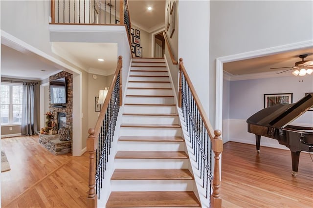 carpeted bedroom with connected bathroom and ceiling fan