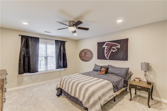 carpeted bedroom featuring ceiling fan