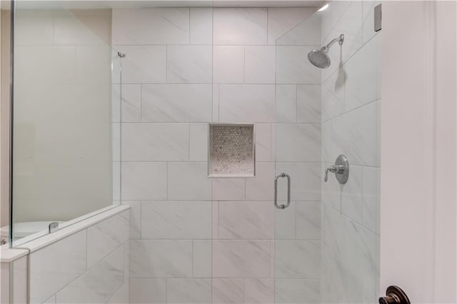 bathroom featuring walk in shower