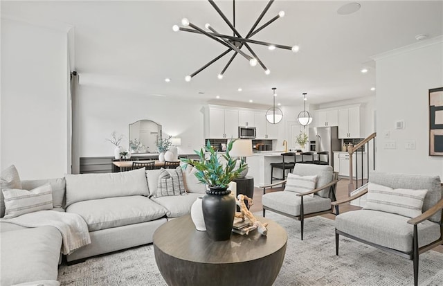 living area featuring light wood-type flooring, stairs, a chandelier, and recessed lighting