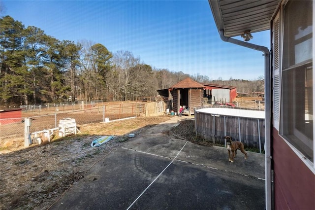 view of patio / terrace with an outdoor structure