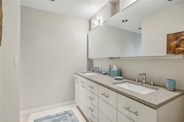 bathroom with vanity and tile patterned floors