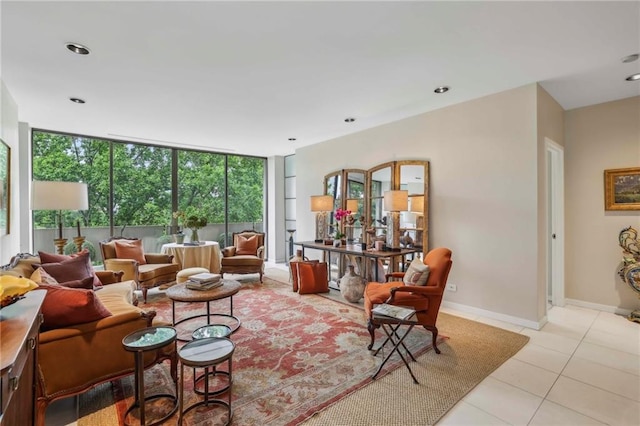 tiled living room with a wall of windows