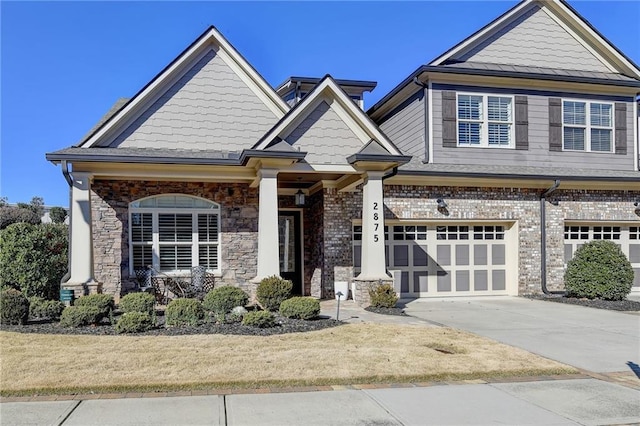 craftsman-style home featuring a garage