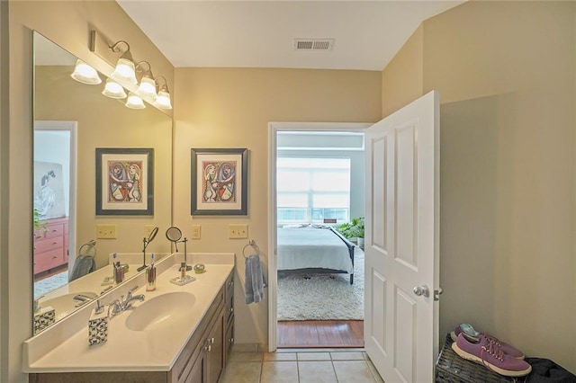 bathroom featuring tile patterned floors and vanity