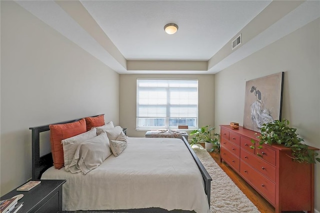 bedroom featuring wood-type flooring