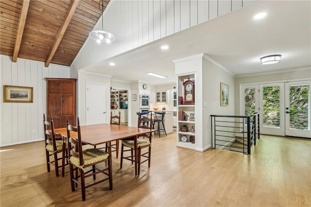 3311 Stillhouse Rd SE, Atlanta, GA 30339 - dining area featuring light wood-type flooring, high vaulted ceiling, wood ceiling with exposed beams, ornamental molding, and baseboards