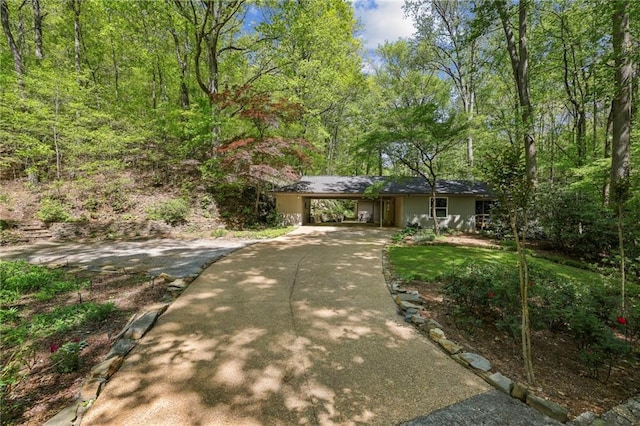 3311 Stillhouse Rd SE, Atlanta, GA 30339 - ranch-style house featuring concrete driveway and a carport