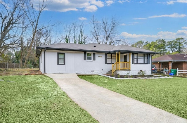 single story home with crawl space, fence, and a front lawn