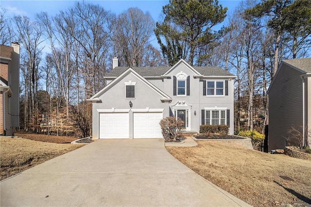 front of property featuring a garage