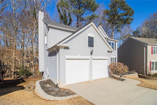 view of home's exterior with a garage