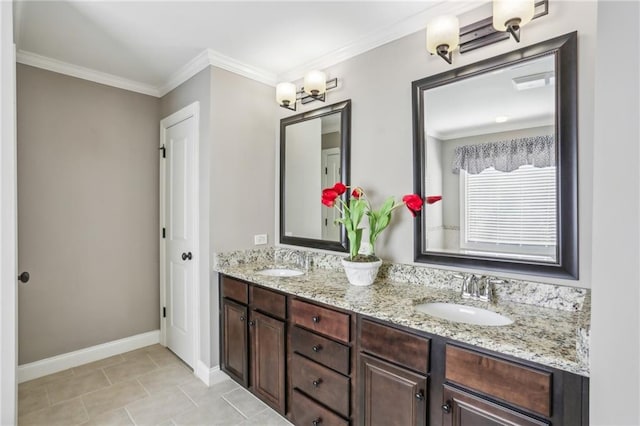 bathroom with tile patterned flooring, vanity, and ornamental molding