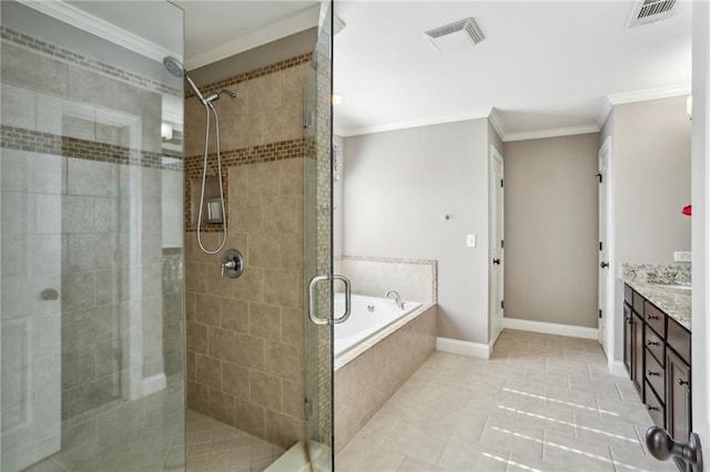 bathroom with plus walk in shower, vanity, crown molding, and tile patterned floors