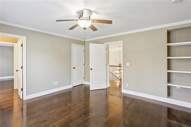 unfurnished bedroom with ceiling fan, ornamental molding, and dark hardwood / wood-style floors