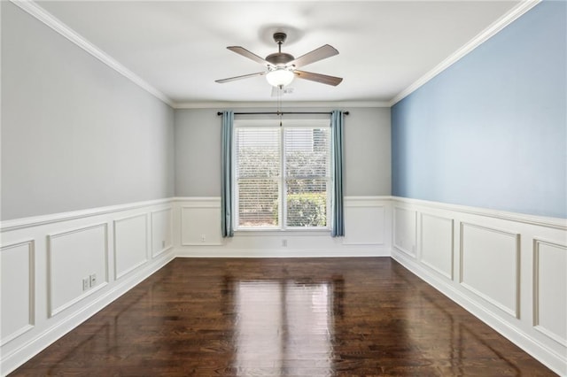 spare room featuring ornamental molding, dark wood-type flooring, and ceiling fan