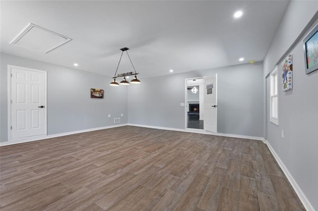 unfurnished room featuring hardwood / wood-style flooring