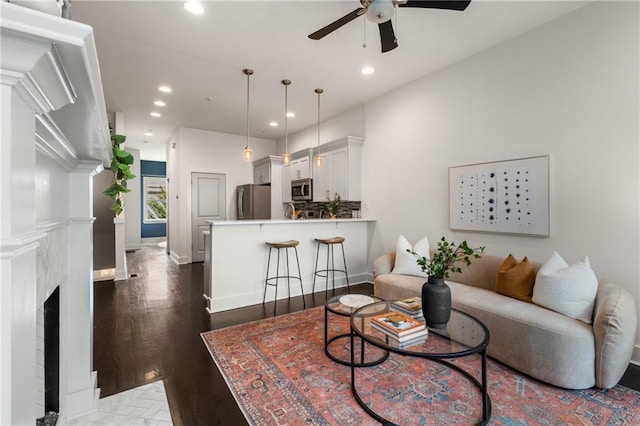 616 Angier Ave NE Unit 4, Atlanta, GA 30308 - living room with recessed lighting, a ceiling fan, wood finished floors, and a fireplace with flush hearth