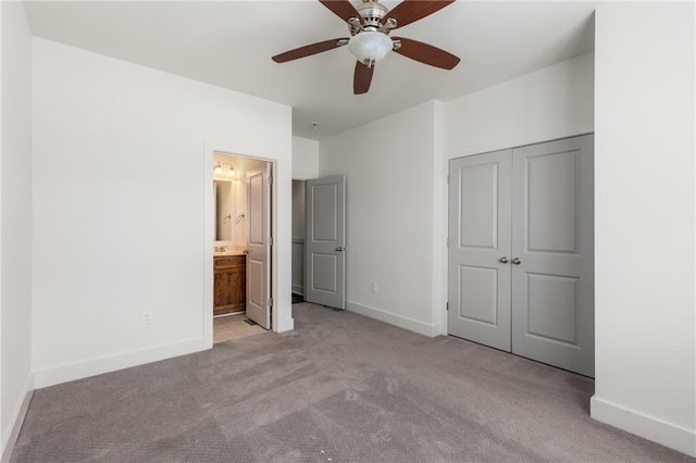 616 Angier Ave NE Unit 4, Atlanta, GA 30308 - unfurnished bedroom featuring carpet flooring, a closet, a ceiling fan, and connected bathroom