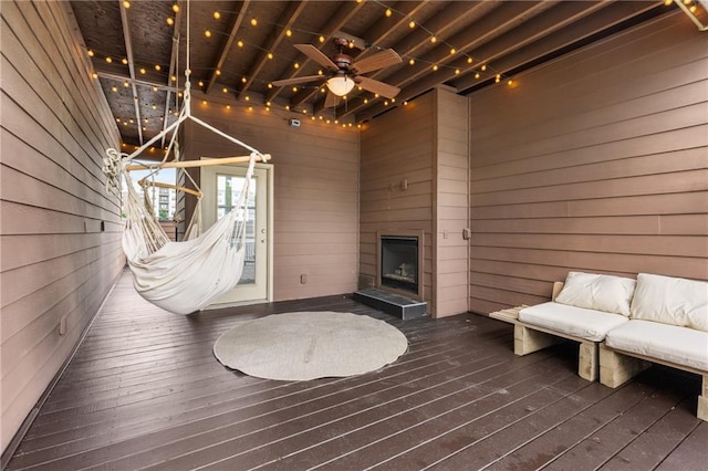 616 Angier Ave NE Unit 4, Atlanta, GA 30308 - living room with wood walls, hardwood / wood-style floors, a fireplace with raised hearth, and track lighting