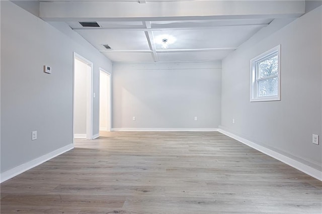 unfurnished room with light hardwood / wood-style flooring