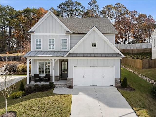 view of front of house with a front lawn and a porch