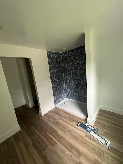 451 Collier Ridge Dr NW, Atlanta, GA 30318 - empty room with baseboards and wood finished floors