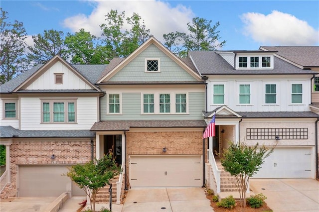 233 Retreat Ln, Canton, GA 30114 - multi unit property with a garage, brick siding, driveway, and board and batten siding